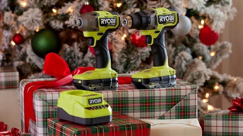 A Ryobi set of tools under a Christmas tree.