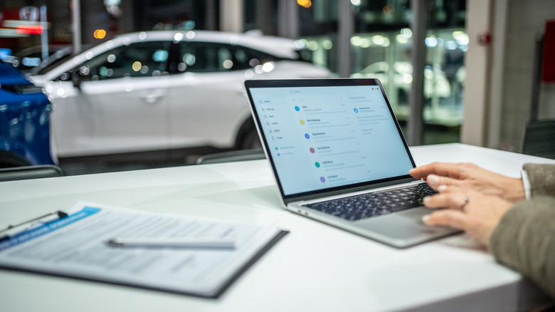Laptop computer in car dealership