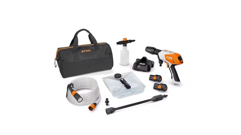 A picture of the stihl rca 20 mini pressure washer kit including two batteries and a charger