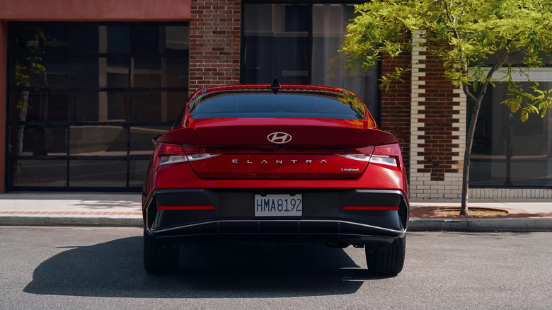 2026 elantra in red from the back on road