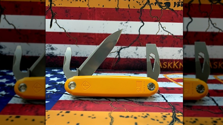 Jefferson knife in front of painted American flag background