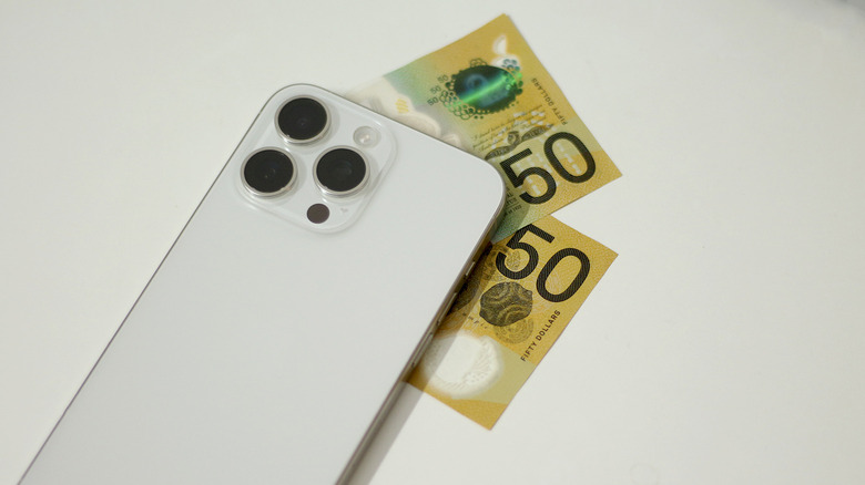 iPhone on top of money