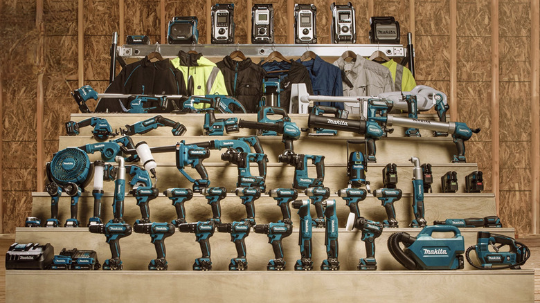 Makita 12V power tools displayed on a shelving unit