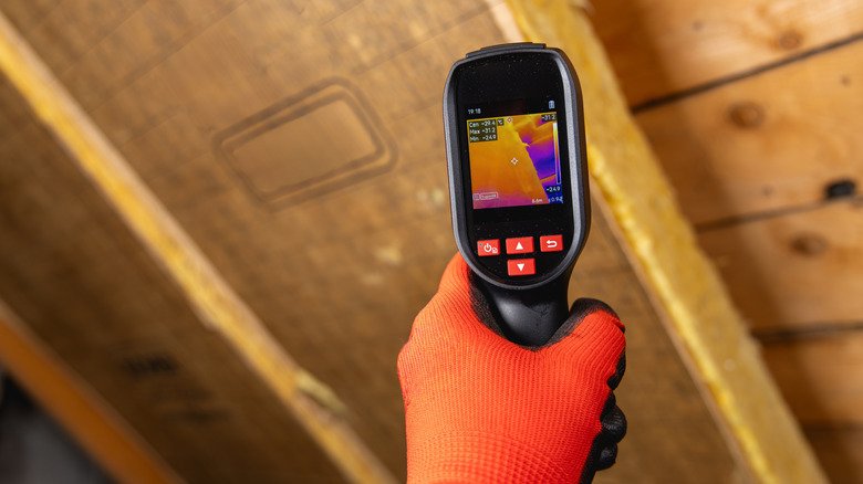 Energy audit being done on roof