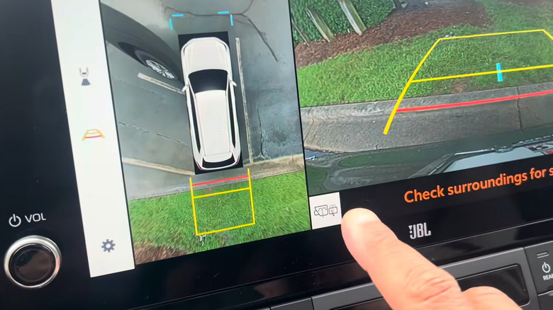 Toyota Grand Highlander backup camera includes washer button