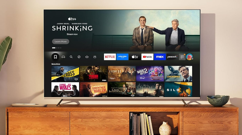 Hisense Class QD7QF in a living room, the TV show "Shrinking" is selected in a menu.