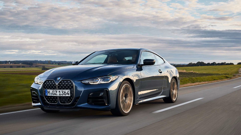 BMW 4 Series Coupe driving in Europe scenic road