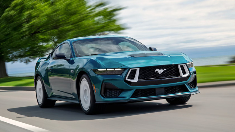 Ford Mustang GT driving on road