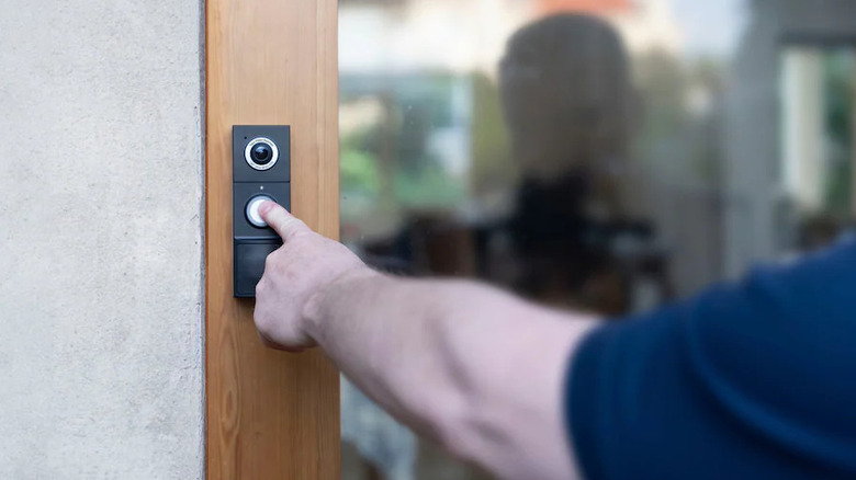 Tapo Video Doorbell on wooden frame