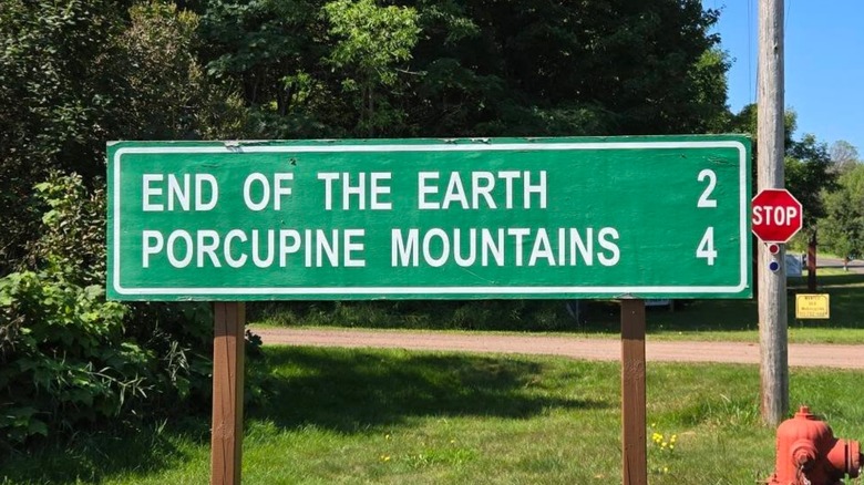 A sign for the End of the Earth and Porcupine Mountains outside.