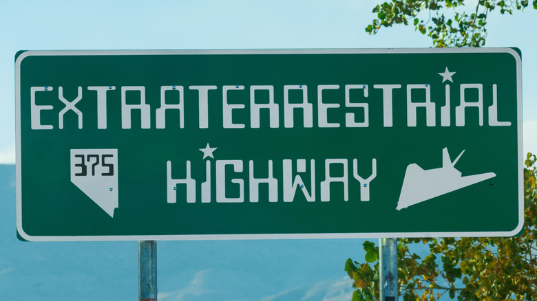 An Extraterrestrial Highway sign in the daytime.