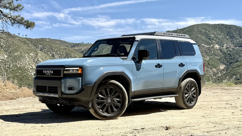 Toyota Land Cruiser parked on an off-road trail