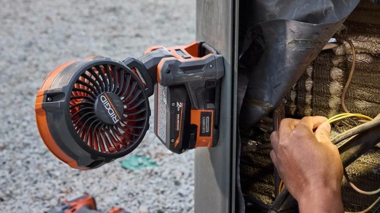 Ridgid 18V Cordless Magnetic Clamp Fan in use
