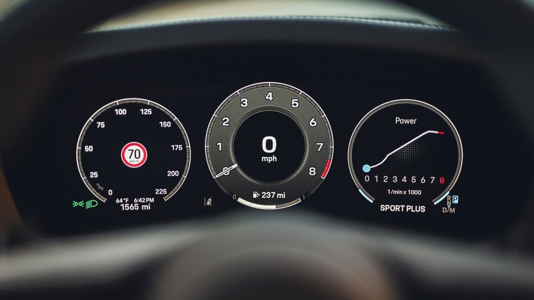 A close-up of a 992 2026 Porsche 911 digital gauge cluster.