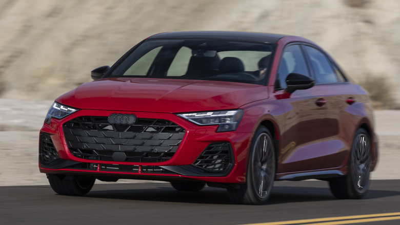 Front 3/4 view of Audi S3 in mountain road setting