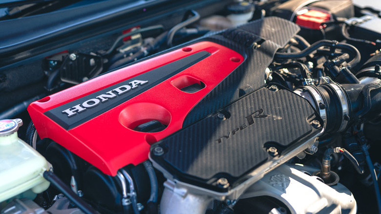 Close view of Honda Civic Type R engine under hood of car