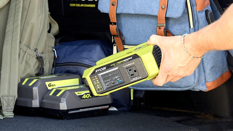 Person using Ryobi 40V power station