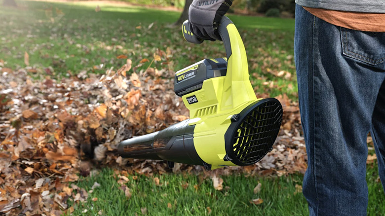 Person using Ryobi 40V leaf blower