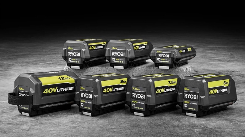 Ryobi 40V batteries pictured on a stone surface