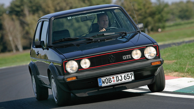 VW GTI Mk1 driving on a track