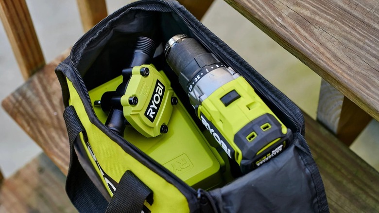 A Ryobi power drill and 1/4" Hex Shank Drill Pump in a tool bag.
