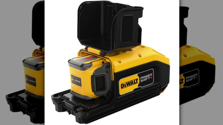 A DeWalt Flexvolt battery inside a Flexvolt to Powershift adapter on a white background.