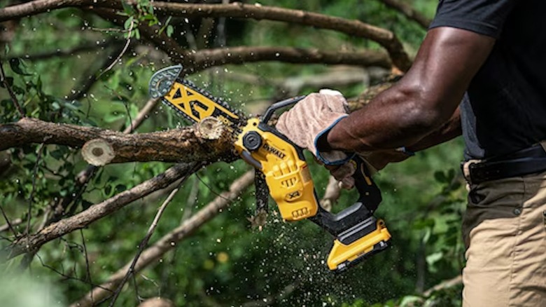 DeWalt 20V Max Pruning Saw in use