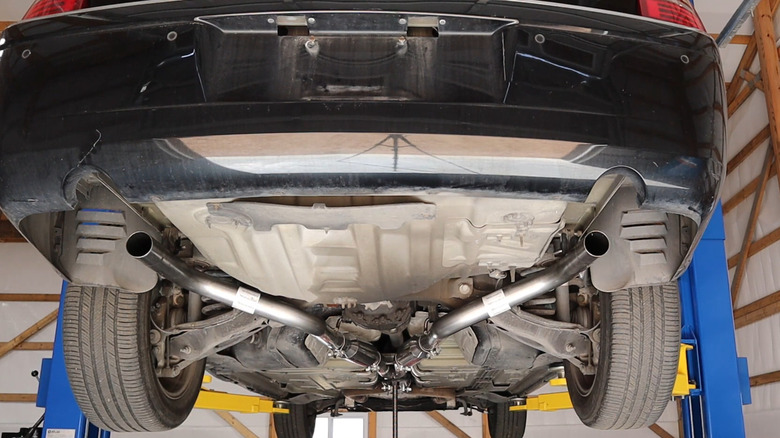 Performance exhaust system on a Chrysler 300C viewed from below