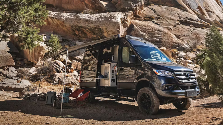 The Mercedes Sprinter Sanctuary with the patio awning open