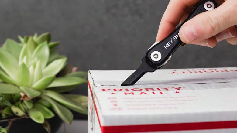 Opening a package with the KeySmart SafeBlade