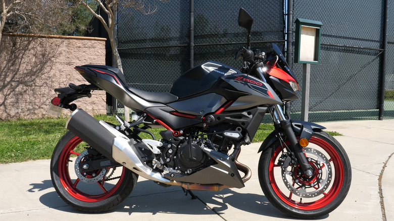A 2025 Kawasaki Z500 parked by the road