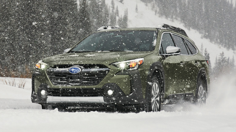 A Subaru Outback in a snowstorm