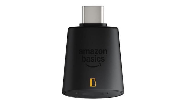 Black Amazon Basics Micro SD Card Reader on a white background