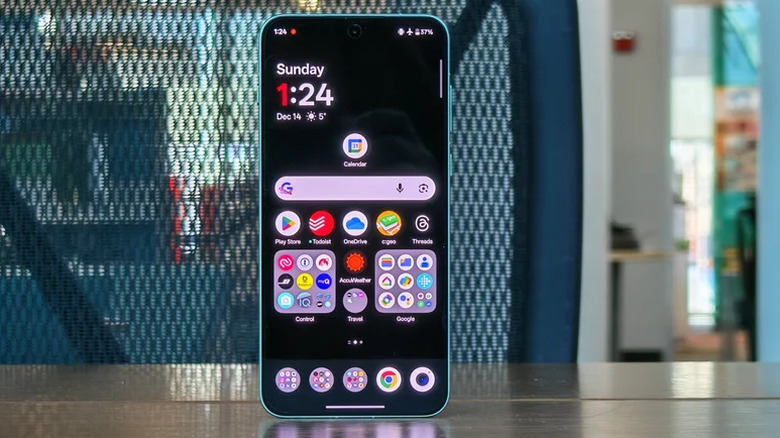 OnePlus 15R standing upright on a desk