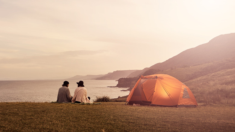 Couple enjoying coastal camp ground