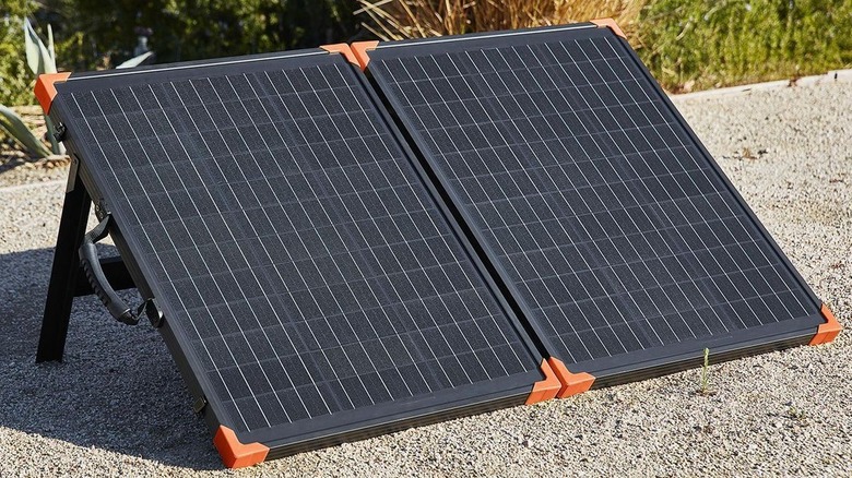 100-Watt Solar Panel Briefcase on gravel