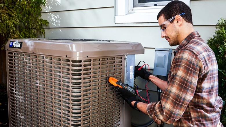 Technician working on York heat pump