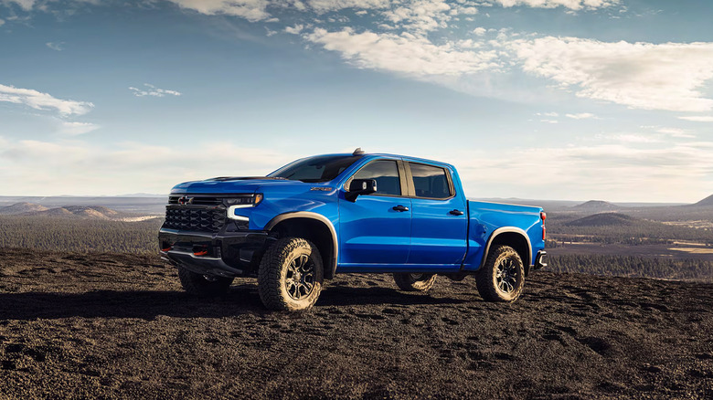 A blue 2025 Chevrolet Silverado ZR2 parked