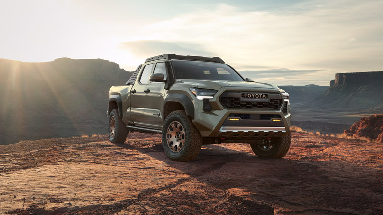 A green 2025 Toyota Tacoma Trailhunter parked
