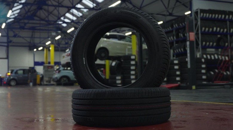 Two Bridgestone Turanza All Season 6 tires stacked.