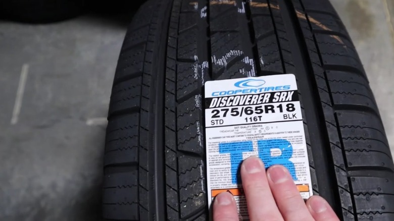 Close-up of Cooper Discoverer SRX tire.