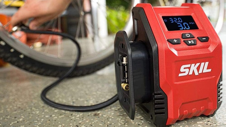 Skil Pwr Core 12V Compact Tire Inflator in use