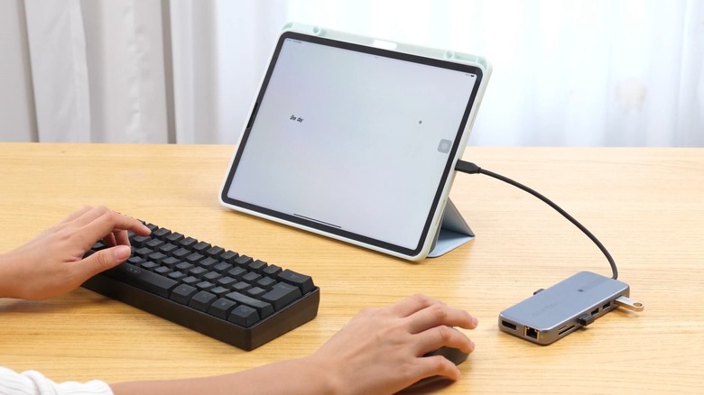 13-in-one docking station connected to laptop