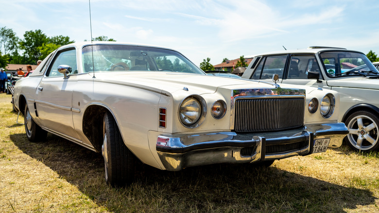 1976 Chrysler Cordoba parked in a field