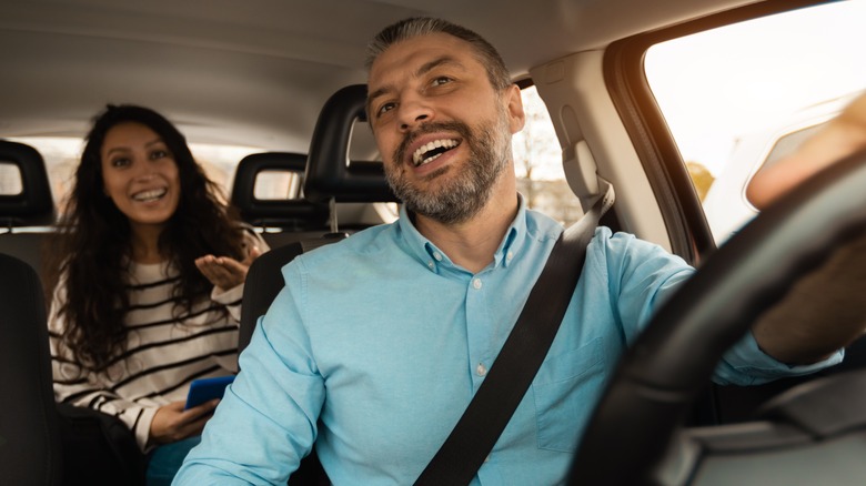 people talking in car