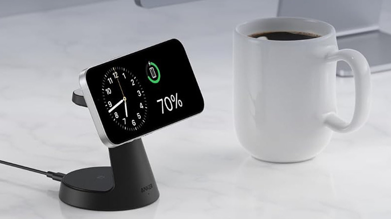 Anker MagGo Charging Station with an iPhone magnetically charging.
