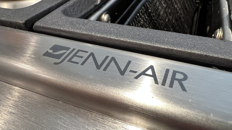 JennAir logo on a sink top.