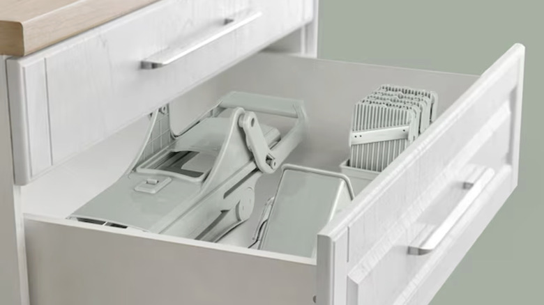 sage green nutri slicer folded up