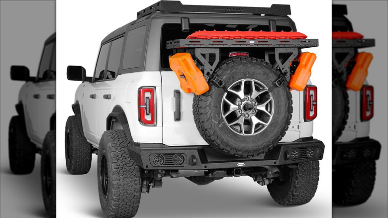 The Hooke Road storage rack mounted over a spare tire on a Jeep