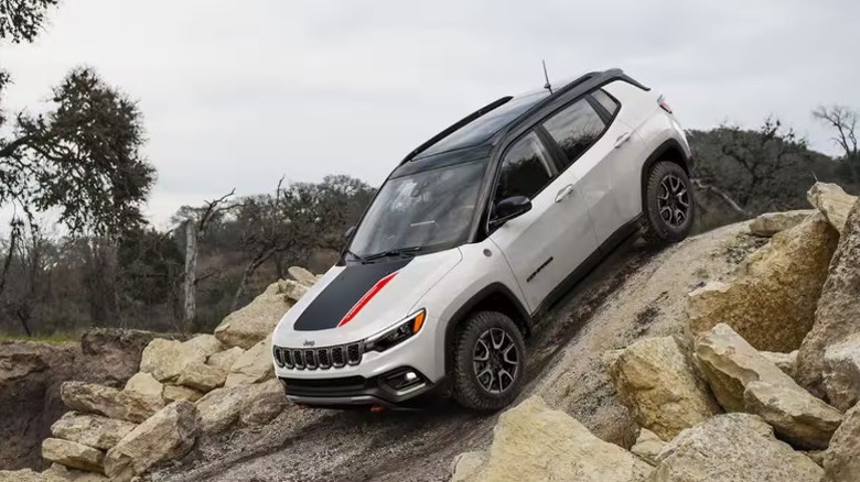 A 2025 Jeep Compass coming down a small hill
